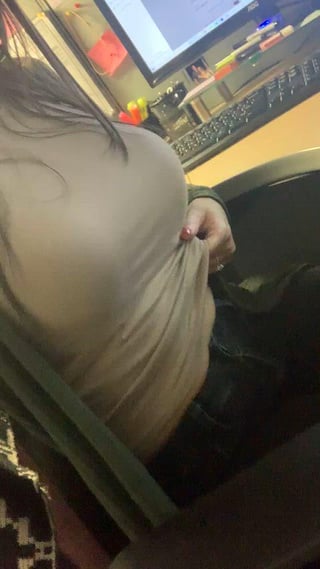 Pulling out my perky fat tits right in the middle of the office