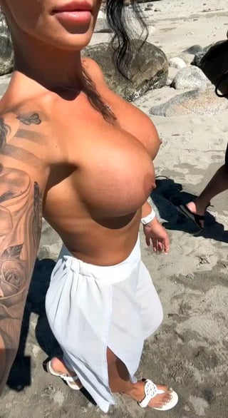 Walking the beach topless with my DDs out on display of course