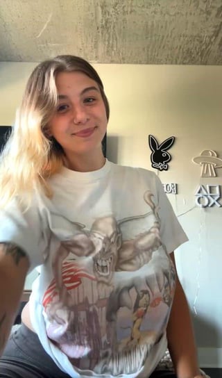 Revealing her huge tits