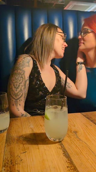 Kissing my friend at the bar in front of everybody